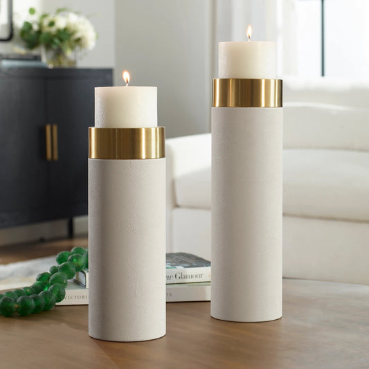 Wessex Pillar Candleholders by Uttermost in brass. Made from iron 50%, pu leather 10%, other 40% in a modern style.