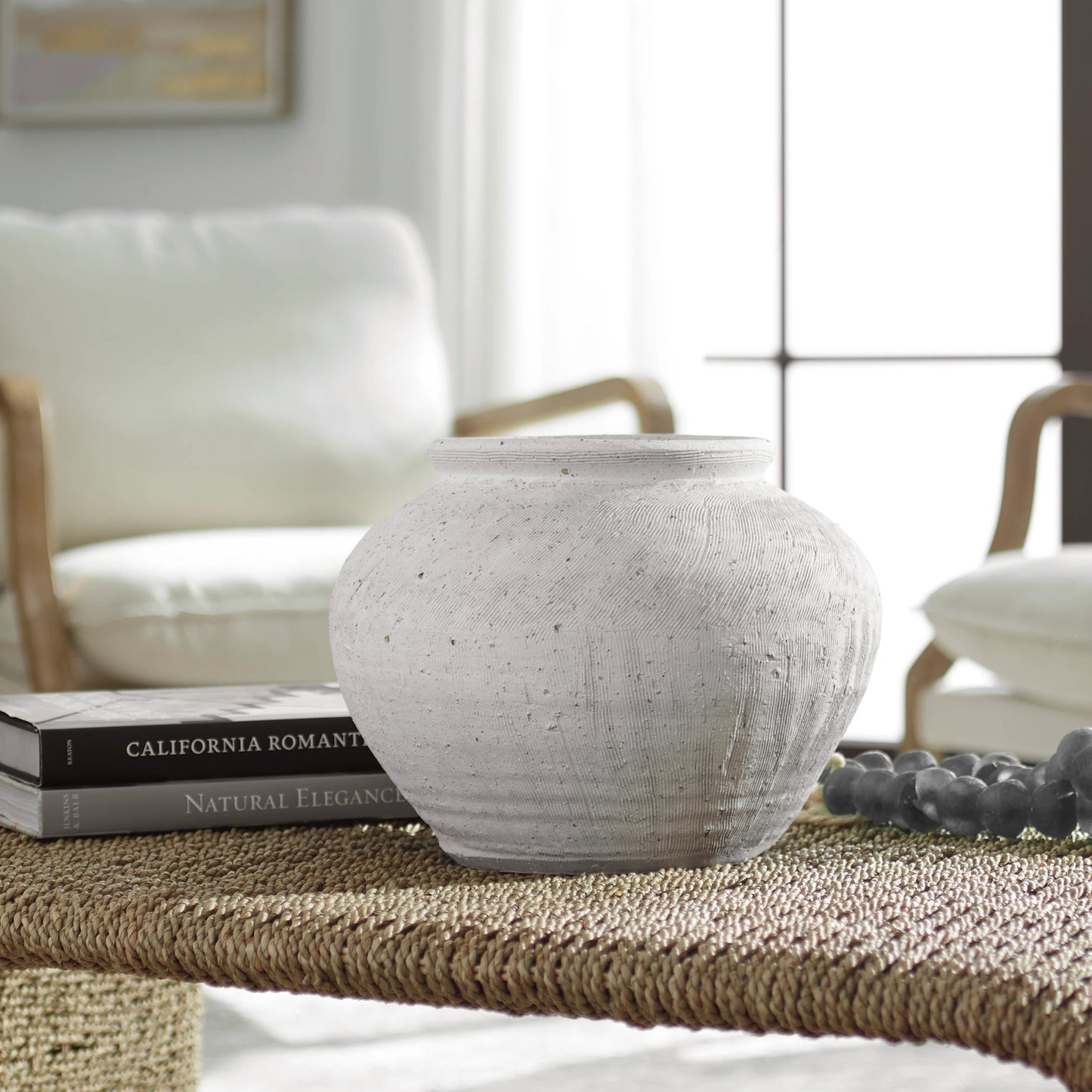 007 SI-2146822 | Closeup | Floreana Round Vase by Uttermost in white. Made from ceramic in a modern style.