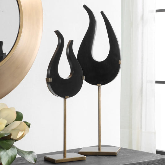Flame Sculptures by Uttermost in brass. Made from man-made stone, metal in a modern style.