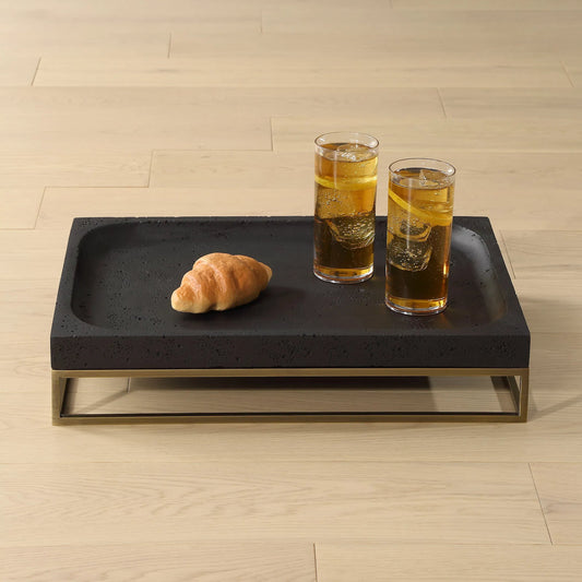Shadowstone Cast Tray by Uttermost in brass. Made from steel, black rice stone resin in a modern style.