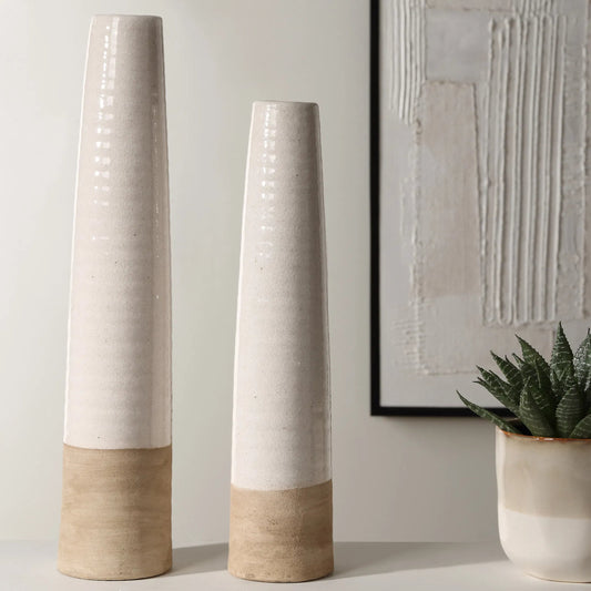 Sands Ceramic Vases by Uttermost in white. Made from ceramic in a transitional style.