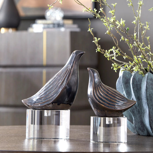 Nesting Bird Sculptures by Uttermost in gray. Made from crystal, ceramic in a cottage & farmhouse style.