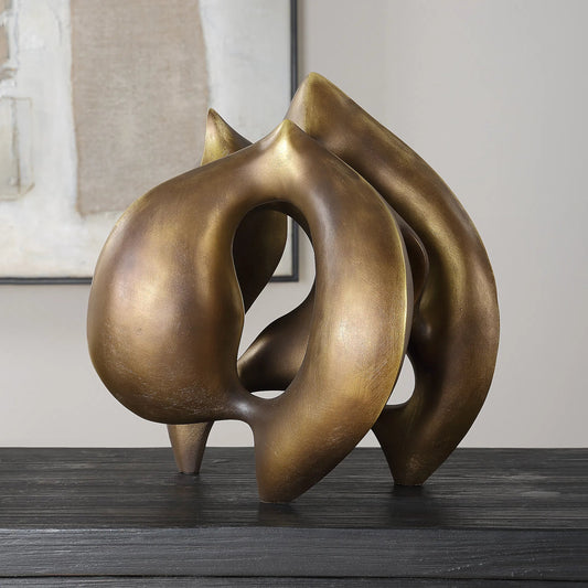 Celestial Flow Sculpture by Uttermost in bronze. Made from polyresin in a modern style.