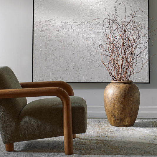 Rustic Earth Terracotta Planter by Uttermost in brown. Made from terracotta in a rustic style.