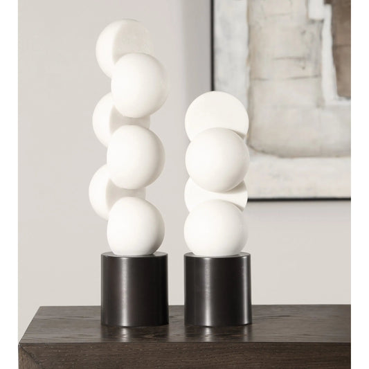 Symmetry Sculptures (Set of 2) by Uttermost in white, dark bronze. Made from rice stone, iron in a modern style.