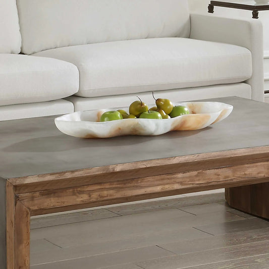 Organic Elegance Wavy Oval Bowl by Uttermost in earthy tones. Made from resin in a transitional style.