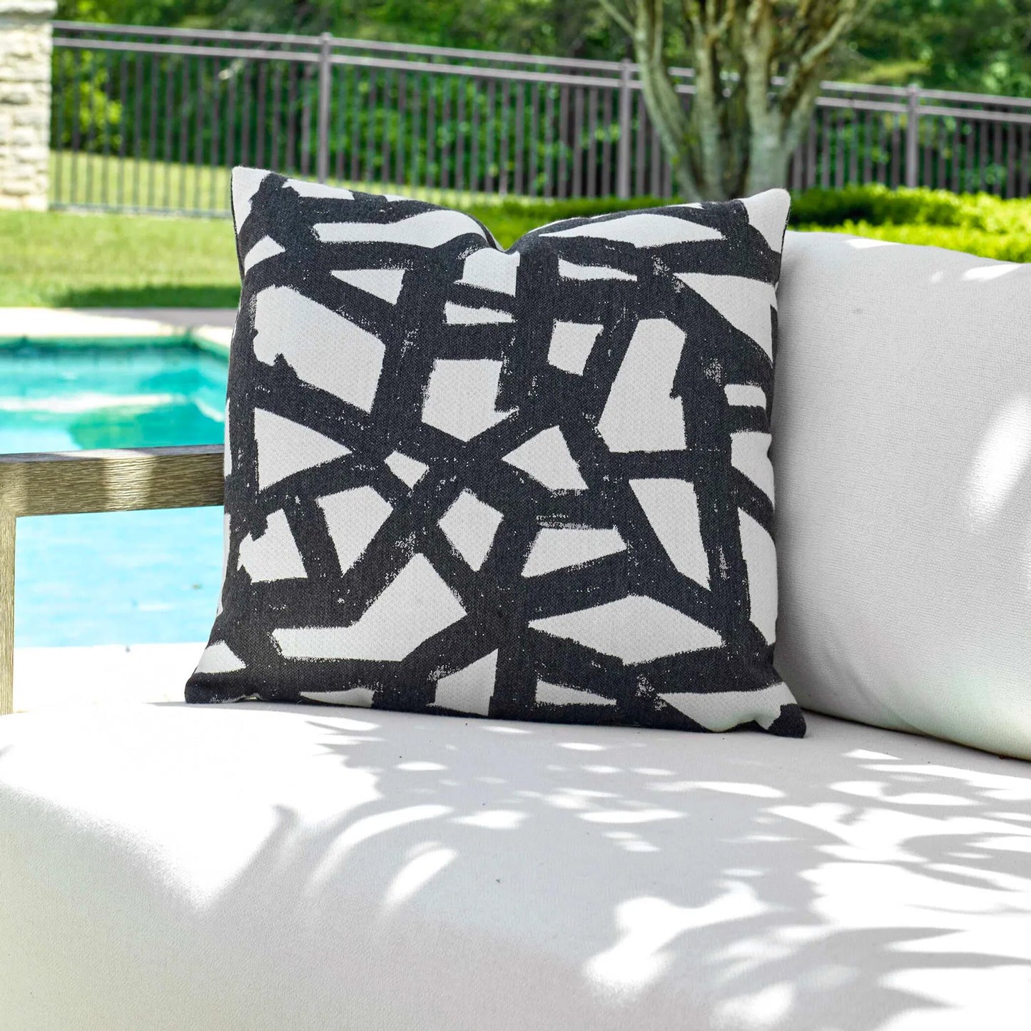 003 SI-2386896 | Lifestyle | Draft Onyx Outdoor Pillow by Uttermost in ivory, onyx. Made from acrylic, polyester in a eclectic & global style.