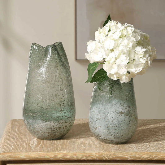 Chianti Seeded Glass Vases by Uttermost in blue, green. Made from glass in a unique style.