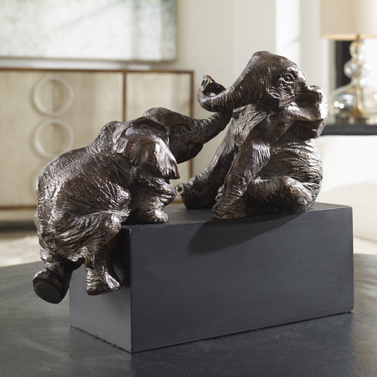 Playful Pachyderms Bronze Figurines by Uttermost in bronze. Made from resin in a eclectic & global style.