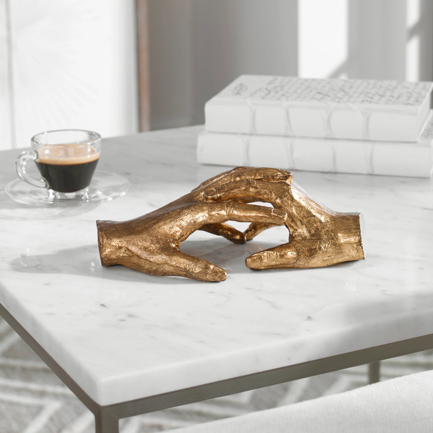 003 S-252546 | Lifestyle | Hold My Hand Sculpture by Uttermost in gold. Made from iron in a modern style.