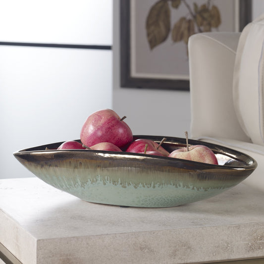 Iroquois Glaze Bowl by Uttermost in green. Made from earthenware in a eclectic & global style.