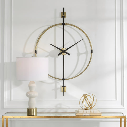 Time Flies Wall Clock by Uttermost in brushed brass, satin black. Made from iron in a modern style.
