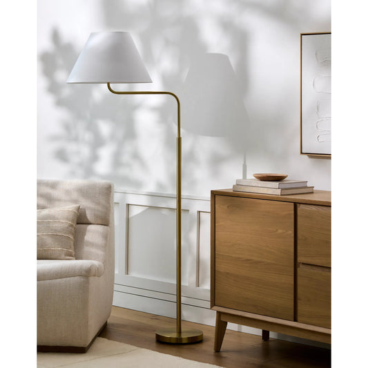 Arcane Floor Lamp by Livabliss in body: metallic - brass, base: metallic - brass, shade: white, cord: translucent and platedplated. Made from iron, cotton, polystyrene in a modern style.
