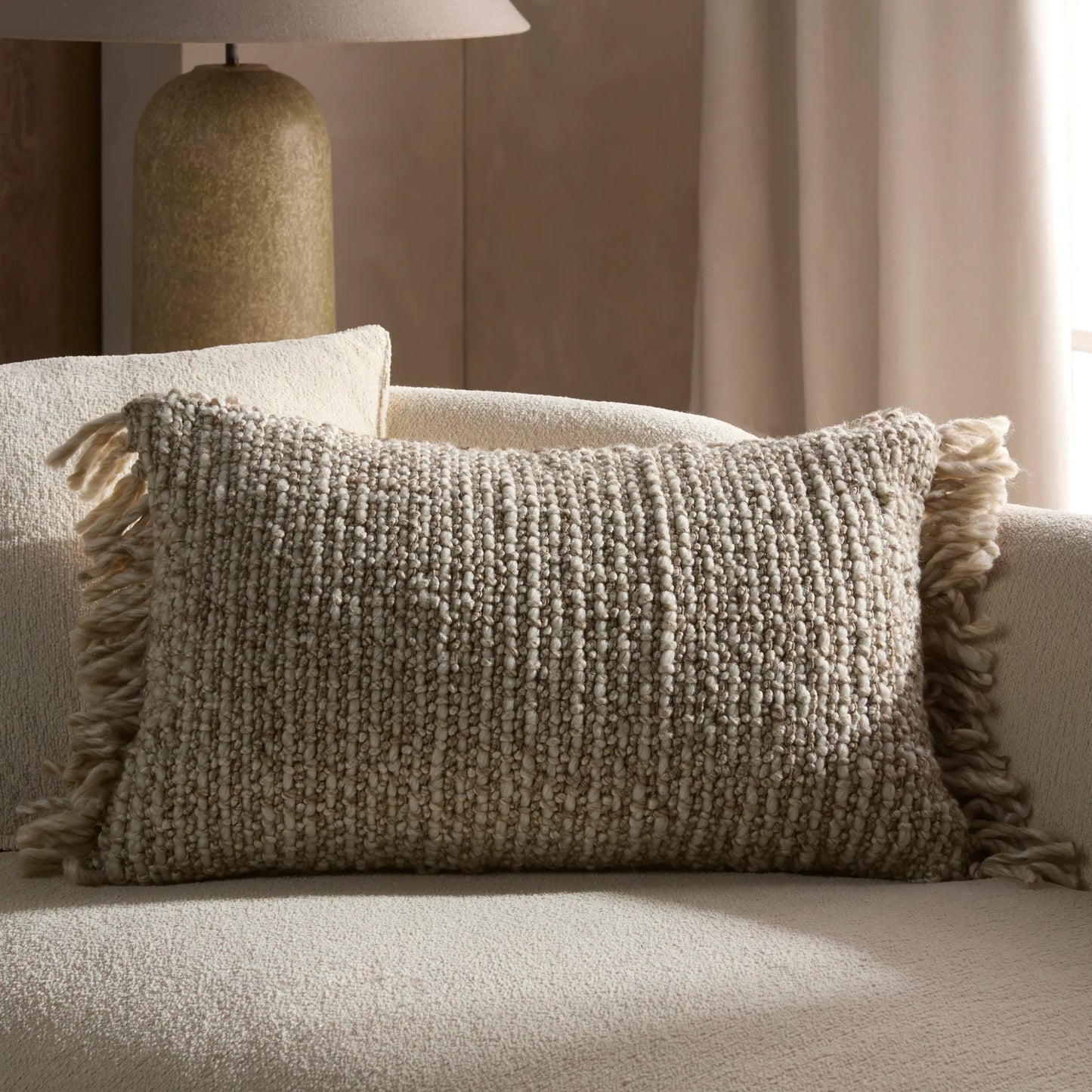 004 SI-2354166,SI-2354167,SI-2354170 | Lifestyle | Angora AGO21 Pillow by Jaipur Living in tan. Made from 60% pet yarn 40% wool in a unique style.