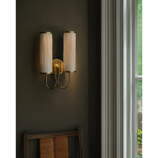 Elaine Wall Sconce by Hudson Valley in aged brass. Made from unique in a transitional style.