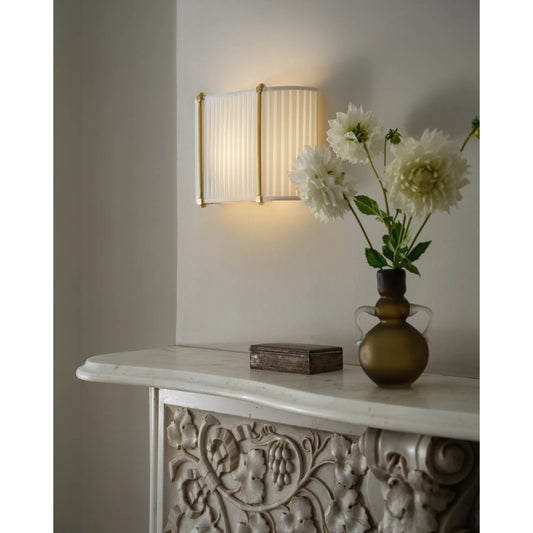 Cornell Wall Sconce by Hudson Valley in aged brass. Made from unique in a transitional style.