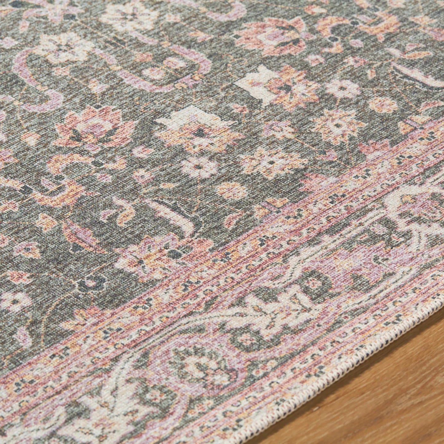 007 SI-2245621,SI-2245622,SI-2245623,SI-2245624,SI-2245625,SI-2245626 | Closeup | Amelie 533408 Rug by Livabliss in medium green, plum, cream, tan, dark green. Made from polyester in a unique style.