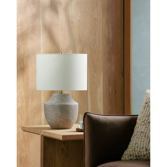 Antoine ANT-002 Table Lamp by Livabliss in body: light gray, shade: beige, finial: metallic - brass, harp: metallic - brass, cord: translucent and coloredplated. Made from resin, linen, polyester, iron in a modern style.