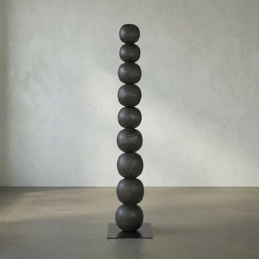 Alpha by Noir in burnt black. Made from munggur and industrial steel in a modern style.