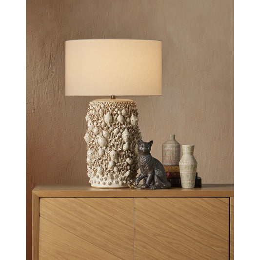 Corfu Ivory Table Lamp by Currey and Company in milky white. Made from ceramic in a eclectic & global style.