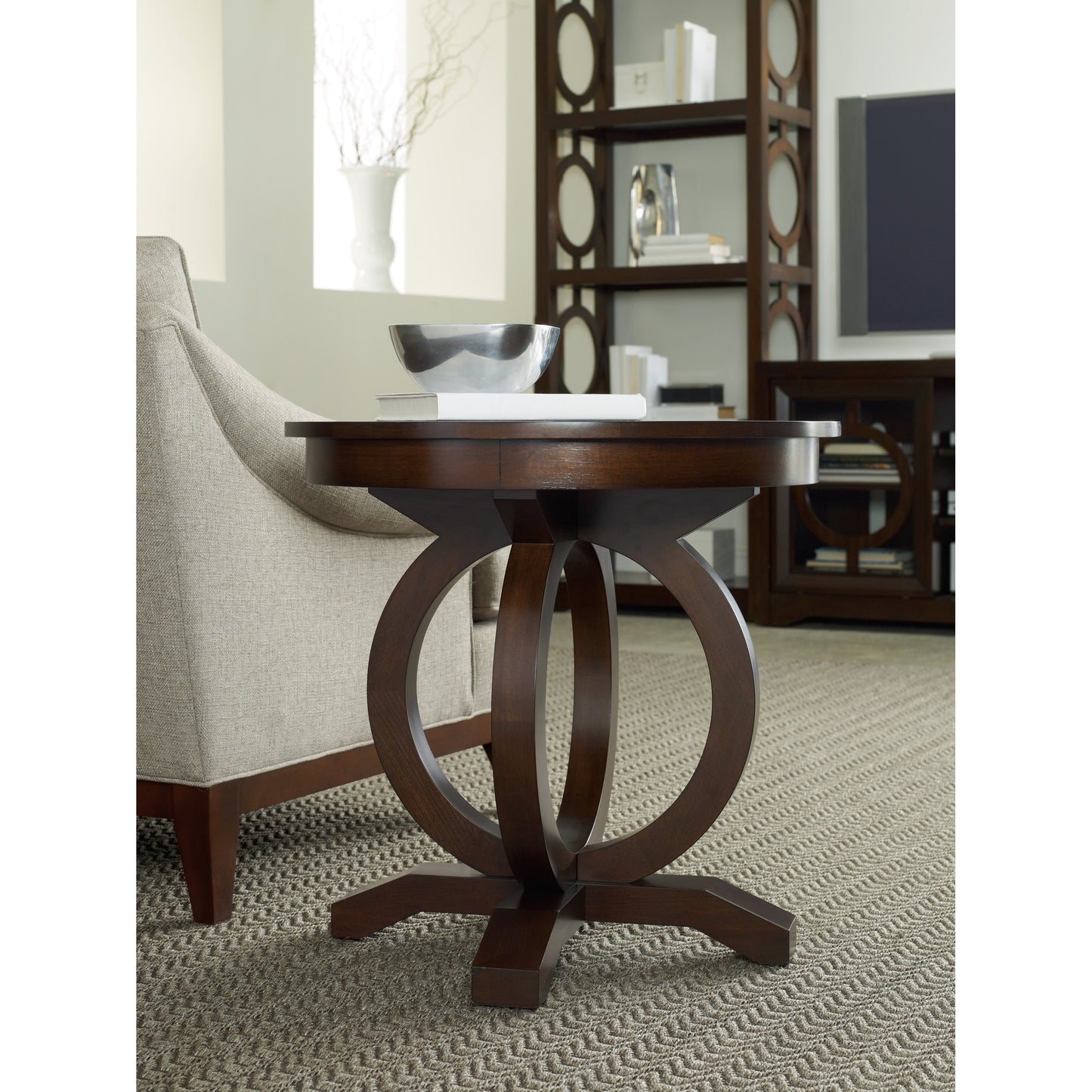 003 SI-1749014 | Lifestyle | Kinsey Round End Table by Hooker Furniture in dark walnut. Made from quartered walnut veneer in a traditional style.