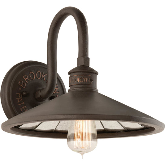 Brooklyn I Wall Sconce by Troy in brooklyn bronze. Made from hand worked iron in a modern style.