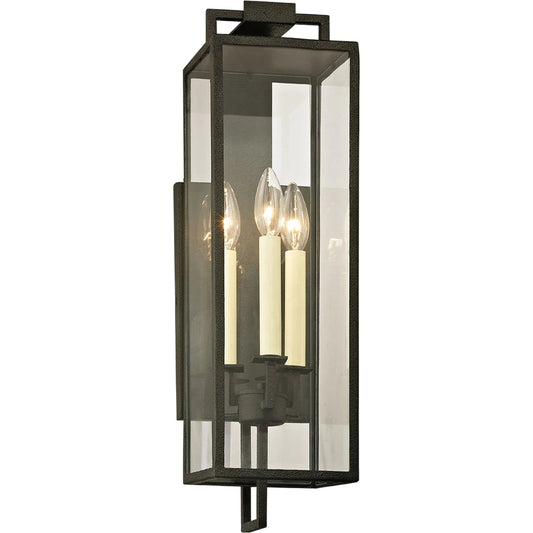 Beckham Wall Sconce by Troy in forged iron. Made from hand worked iron in a modern style.