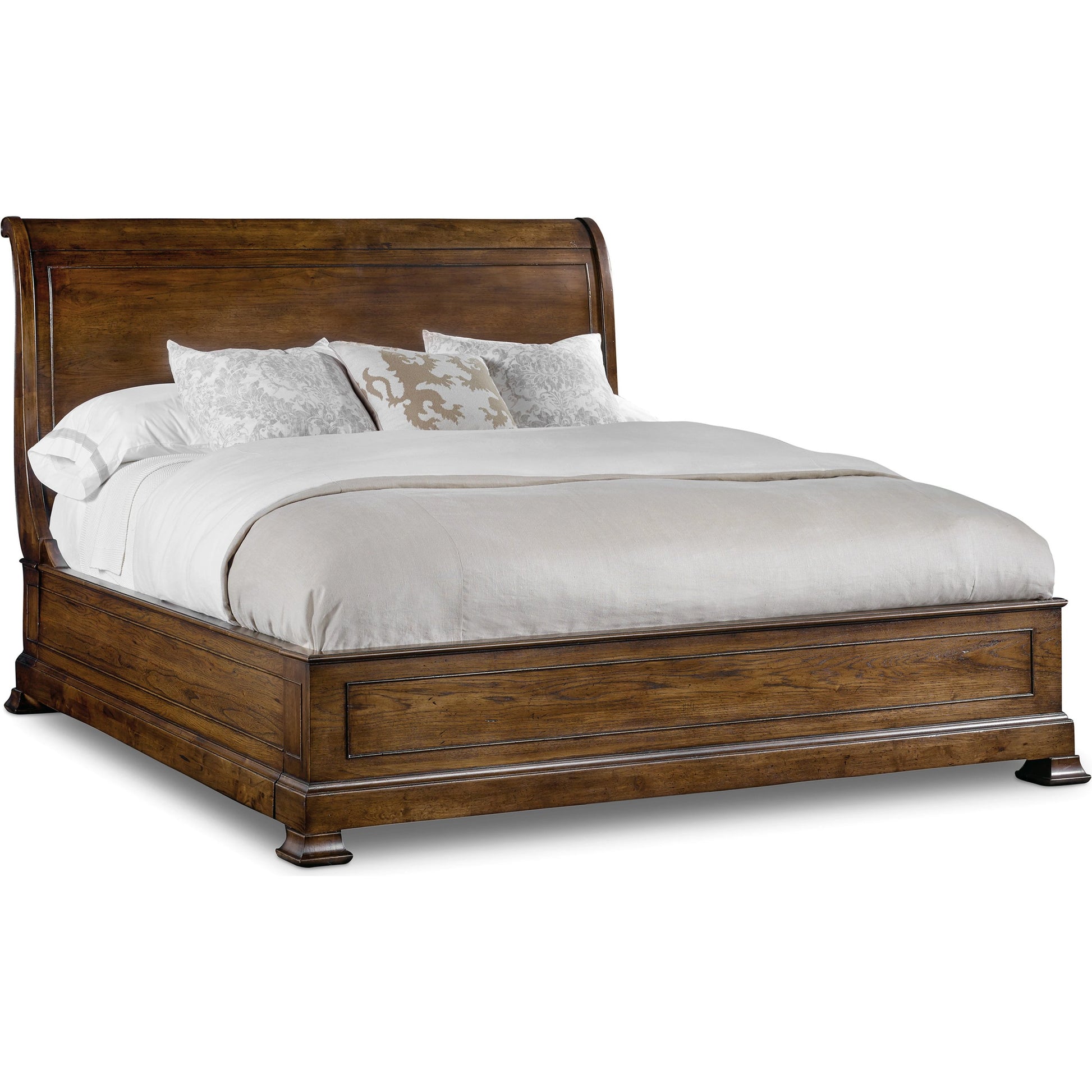 Archivist Sleigh Bed by Hooker Furniture in dark wood. Made from pecky pecan veneers in a traditional style.