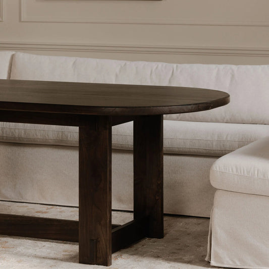 Glenn Oval Dining Table by Moe's Home Collection in dark brown. Made from solid neem wood, iron bar, connecting plates in a traditional style.