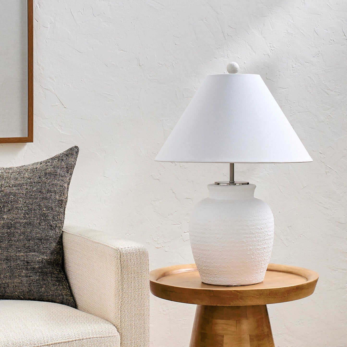 003 SI-2053831 | Lifestyle | Bordeaux Table Lamp - 498984 by Surya in white, metallic silver, translucent, metallic nickel. Made from body: cement, metal, shade (outside): linen, shade (inside): polyester, finial: plastic in a modern style.