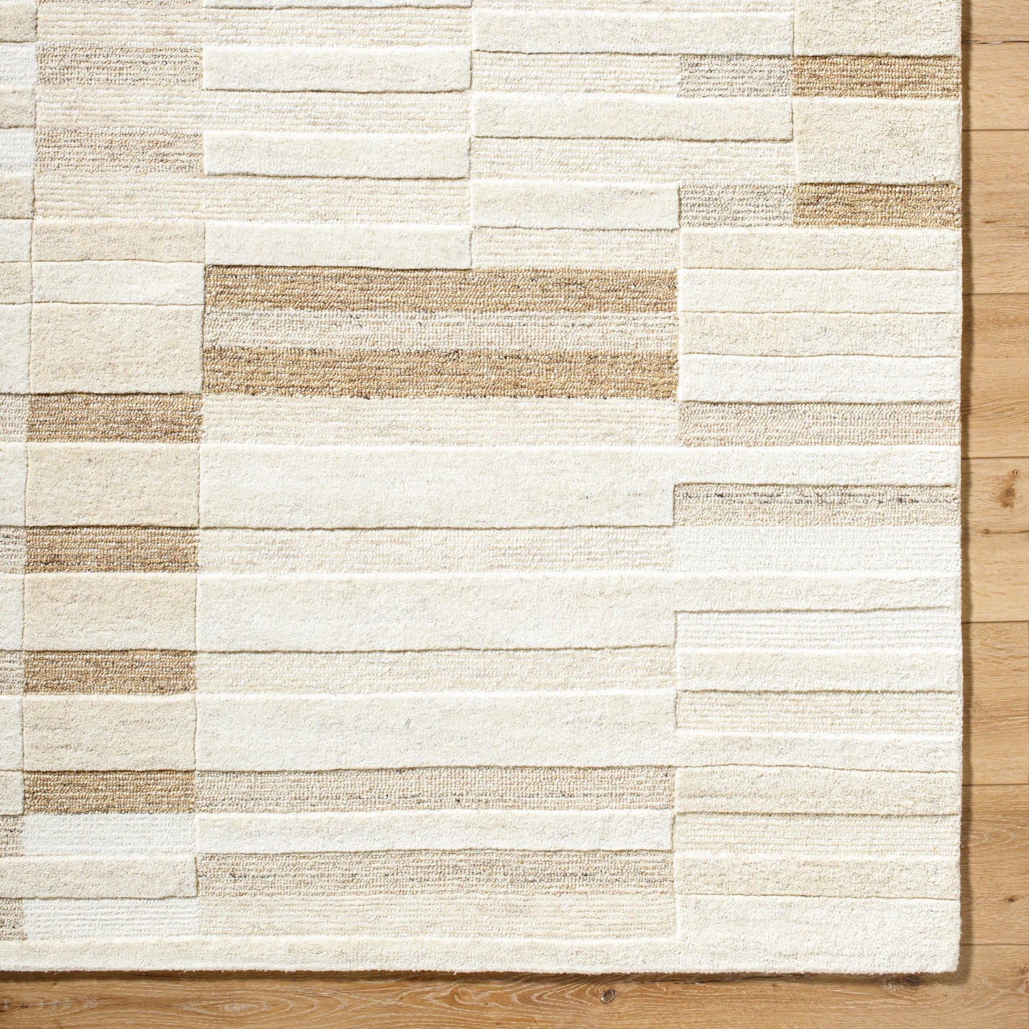 005 SI-2167990,SI-2167991,SI-2167992 | Closeup | Brook Rug - 530267 by Livabliss in ivory, sandstone, taupe, beige, cream. Made from wool in a unique style.