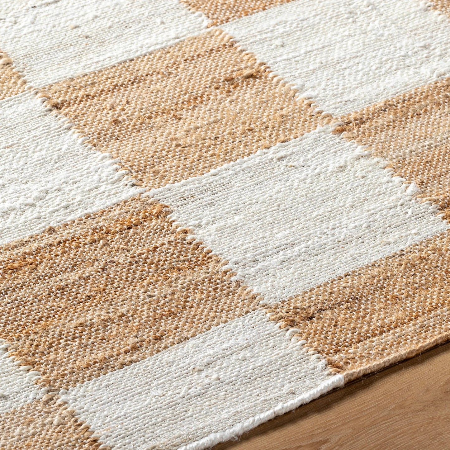 005 SI-2132131,SI-2132132,SI-2132133,SI-2132134 | Closeup | Kamey Rug - 496914 by Becki Owens x Livabliss in light slate, brown, light brown. Made from face: 100% jute, warp: 100% cotton in a unique style.