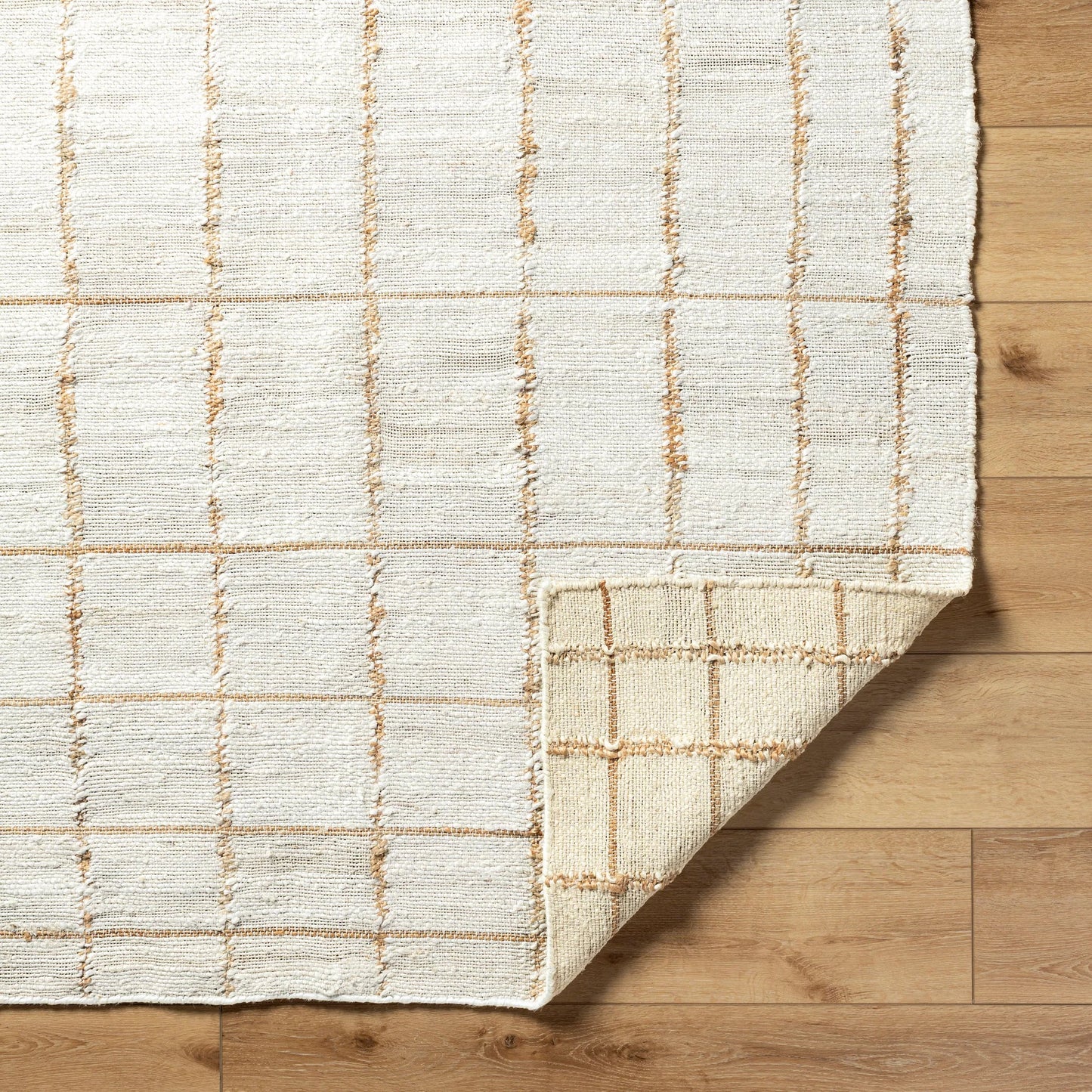 004 SI-2167794,SI-2167795,SI-2167796,SI-2167797 | Closeup | Kamey Rug - 496921 by Becki Owens x Livabliss in ivory, sandstone, wheat. Made from jute in a unique style.