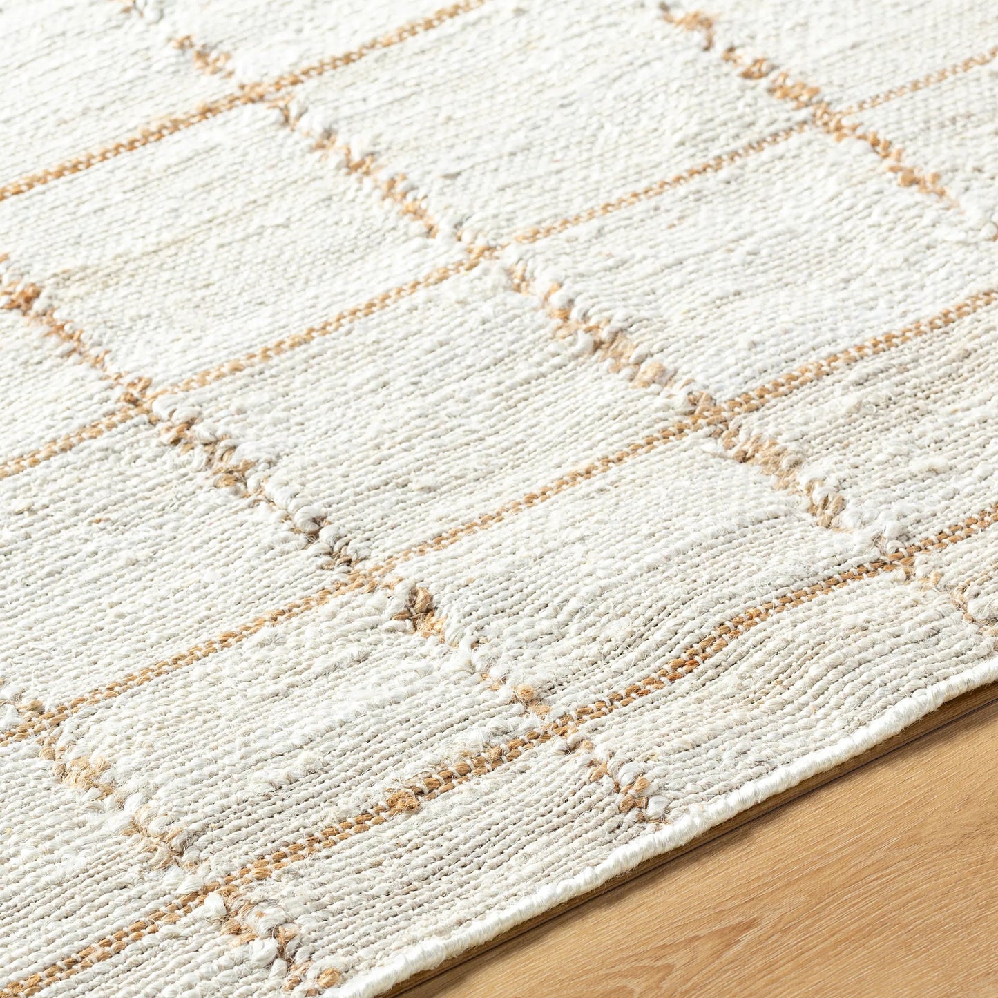 005 SI-2167794,SI-2167795,SI-2167796,SI-2167797 | Closeup | Kamey Rug - 496921 by Becki Owens x Livabliss in ivory, sandstone, wheat. Made from jute in a unique style.