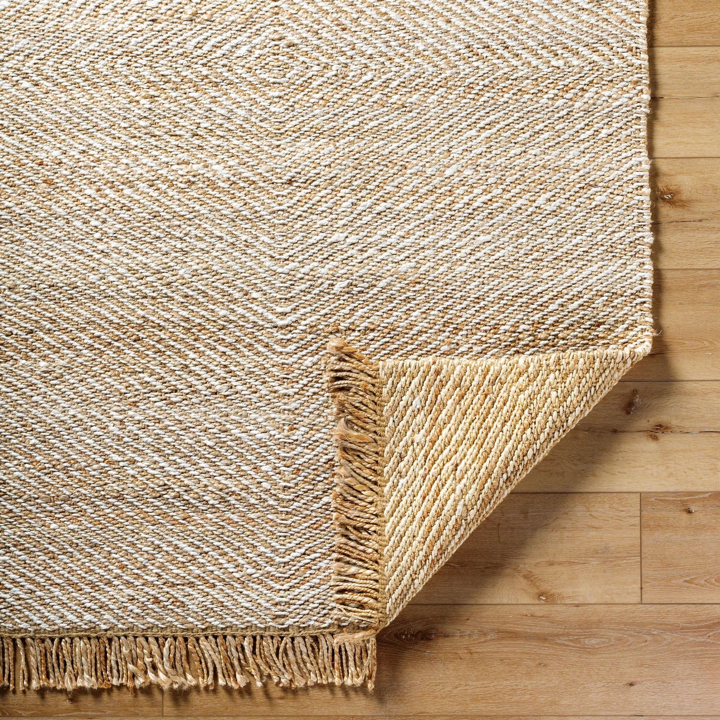 005 SI-2138330,SI-2138331,SI-2138332,SI-2138333 | Closeup | Kamey Rug - 496928 by Becki Owens x Livabliss in beige, wheat, ivory. Made from jute in a unique style.