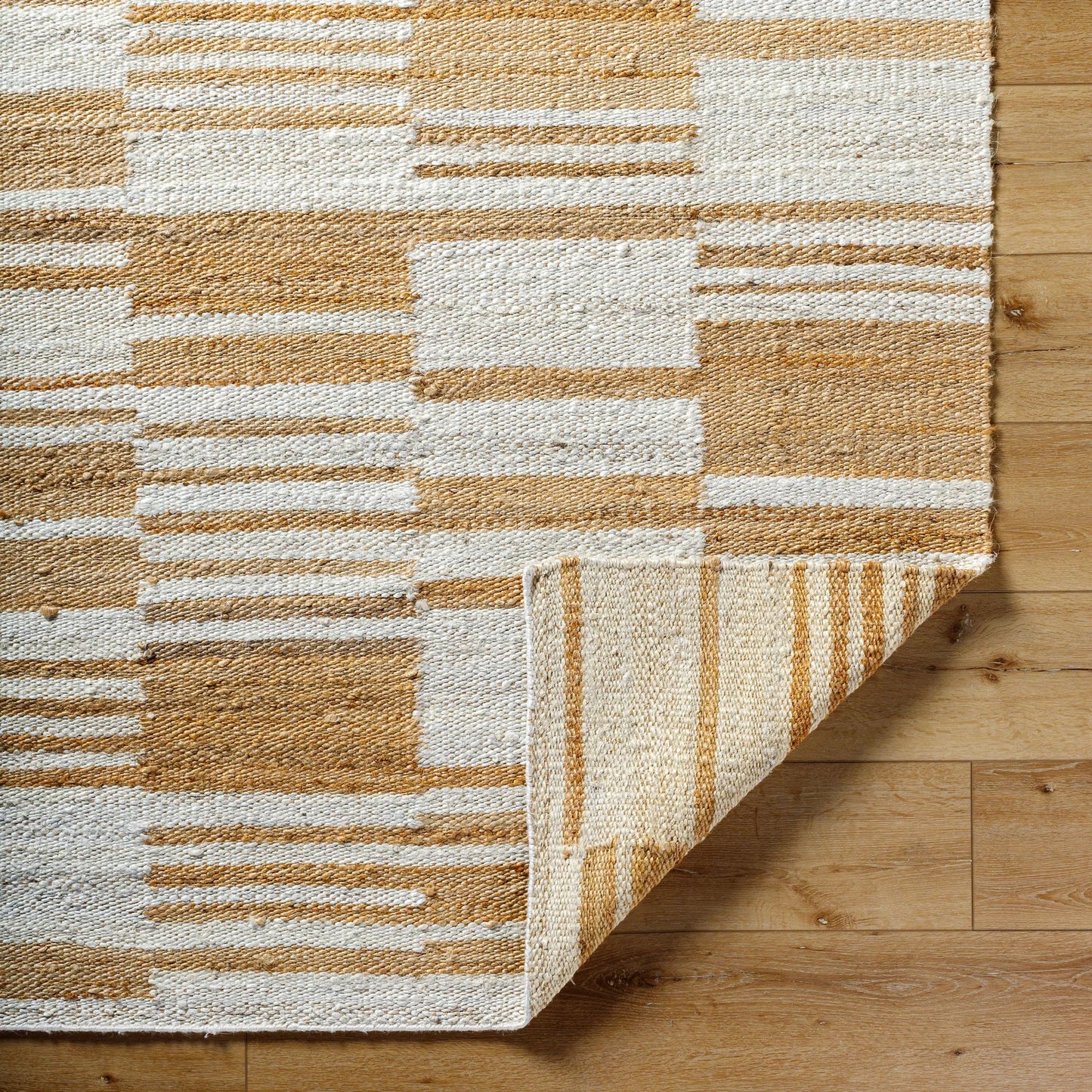 005 SI-2138338,SI-2138339,SI-2138340,SI-2138341 | Closeup | Kamey Rug - 496949 by Becki Owens x Livabliss in pearl, camel, tan, natural. Made from jute in a unique style.