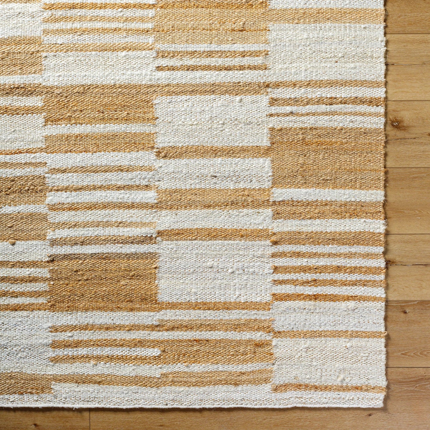 007 SI-2138338,SI-2138339,SI-2138340,SI-2138341 | Closeup | Kamey Rug - 496949 by Becki Owens x Livabliss in pearl, camel, tan, natural. Made from jute in a unique style.