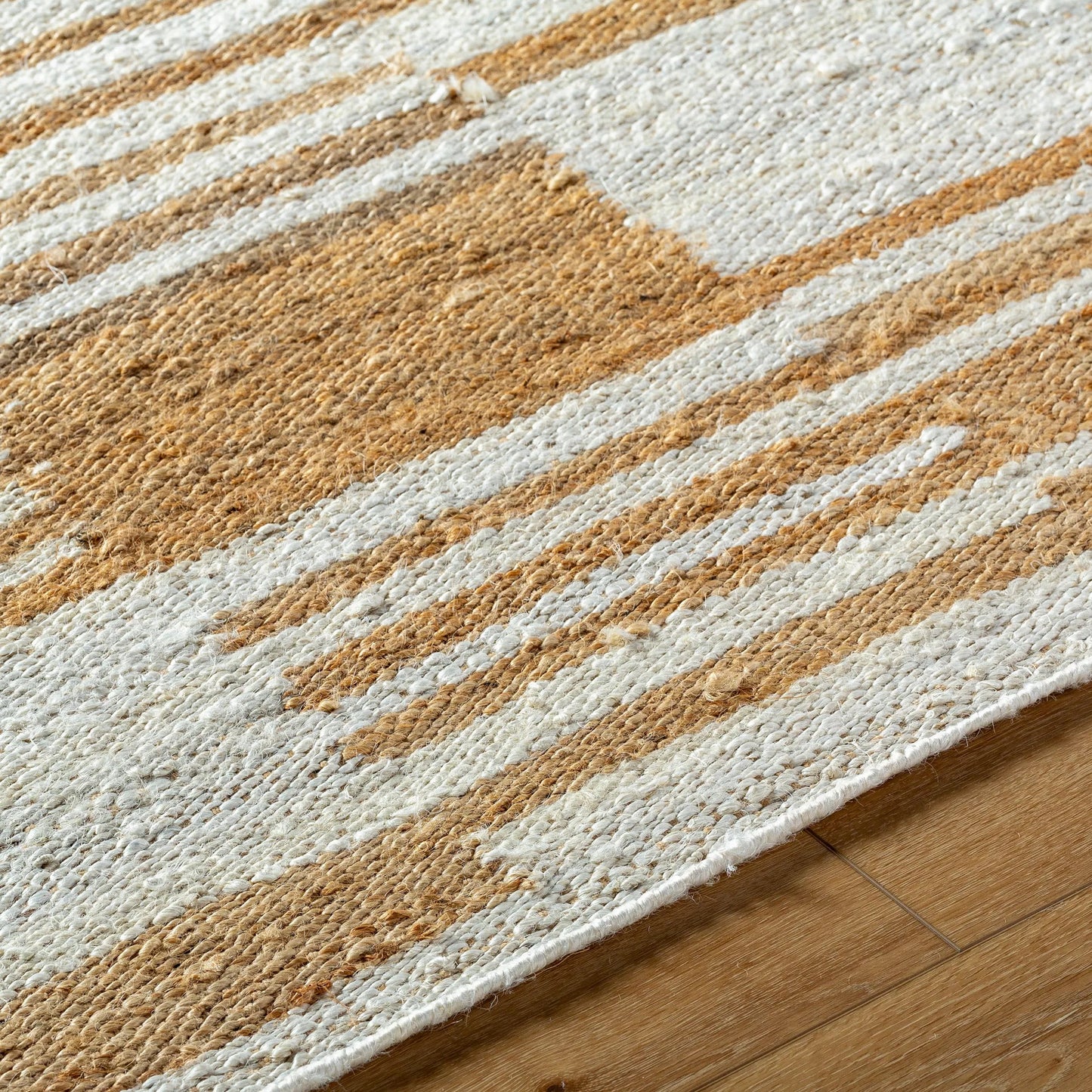 006 SI-2138338,SI-2138339,SI-2138340,SI-2138341 | Closeup | Kamey Rug - 496949 by Becki Owens x Livabliss in pearl, camel, tan, natural. Made from jute in a unique style.
