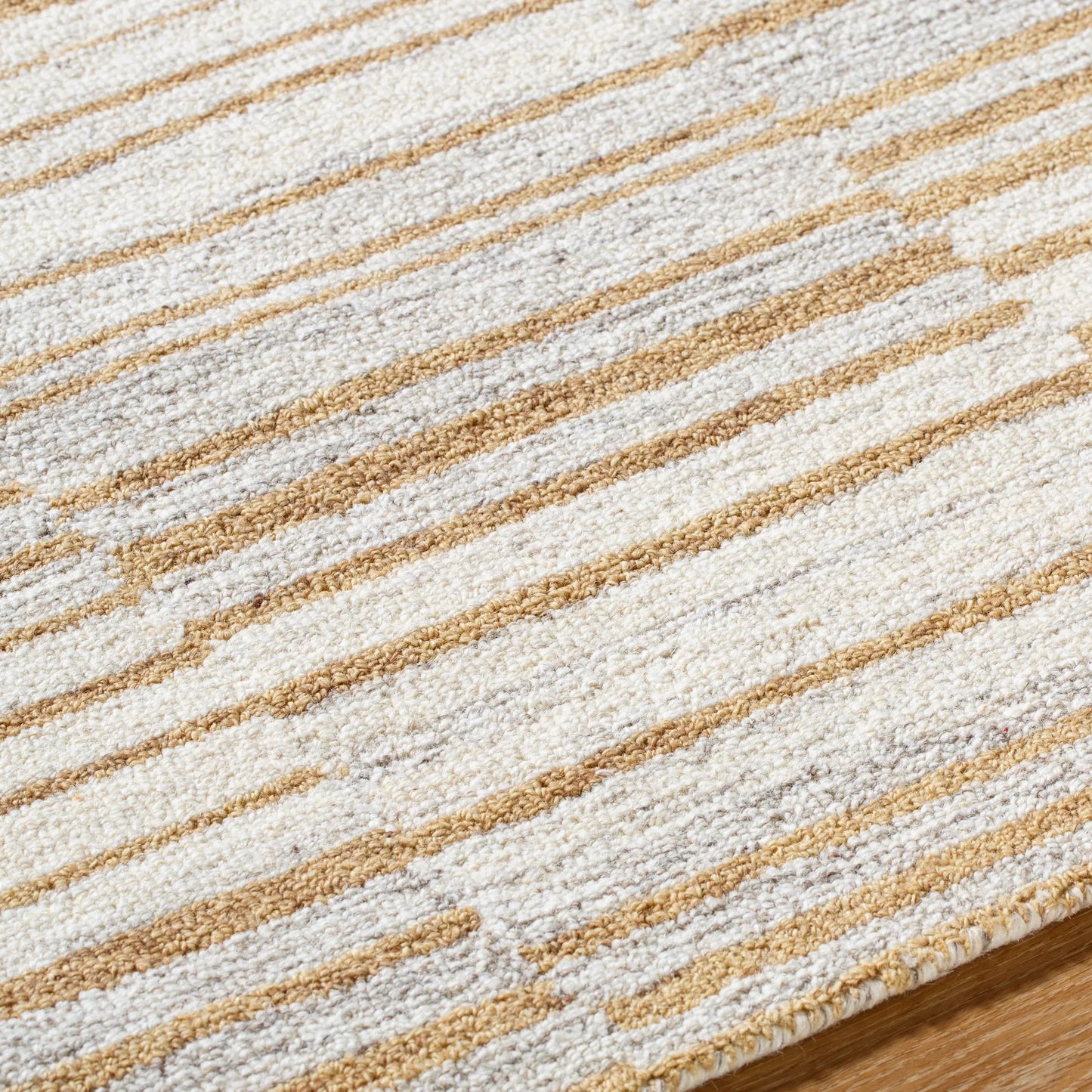 005 SI-2168081,SI-2168082,SI-2168083 | Closeup | Bournemouth Rug - 531096 by Livabliss in pearl, natural, off-white, ash, prairie dust. Made from wool in a unique style.