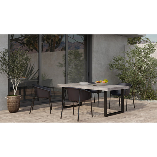 Jedrik Outdoor Dining Table by Moe's Home Collection in dark grey. Made from cement, steel legs in a modern style.