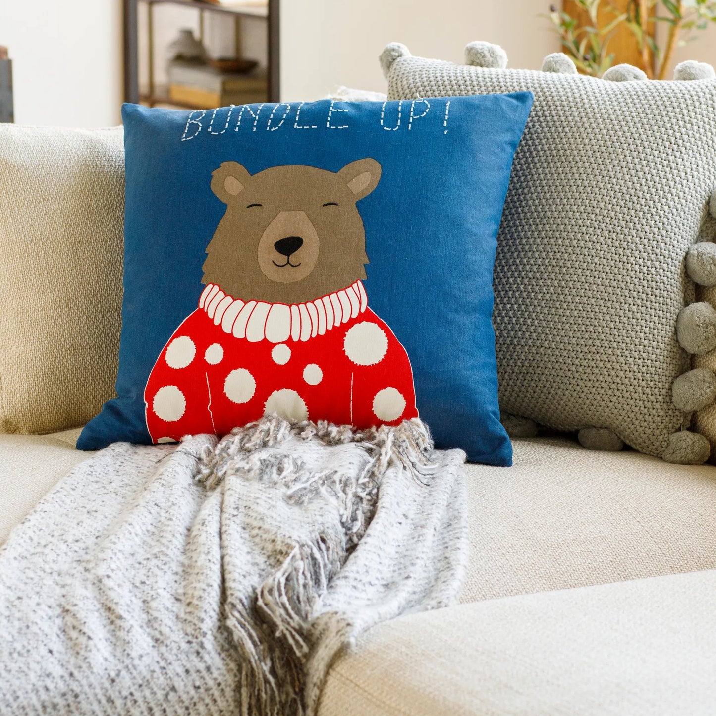004 SI-1878424,SI-1878425,SI-1878426,SI-1878427,SI-1878428,SI-1878429 | Lifestyle | Bundle Up Bear Pillow - 13094 by Surya in dark blue, black, white, red, medium brown. Made from 100% cotton in a unique style.