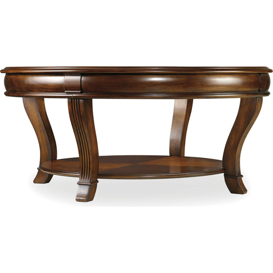 Brookhaven Round Cocktail Table by Hooker Furniture in cherry. Made from cherry veneers, glass in a traditional style.