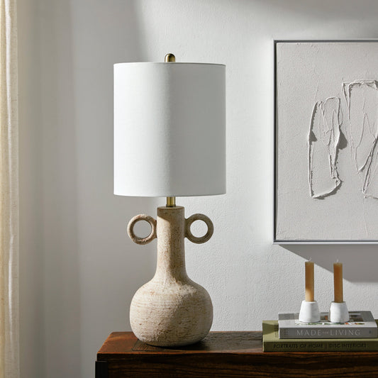 Brava Table Lamp by Surya in mattepolished. Made from shade (outside): linen, shade (inside): polyester, body: ceramic, finial: metal, harp: metal in a modern style.