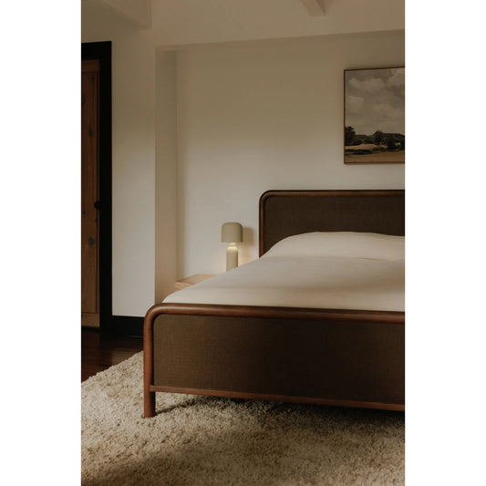 Rye Bed by Moe's Home Collection in warm brown. Made from solid mango wood frame, tatami mat over mdf headboard, footboard, wood slats in a traditional style.