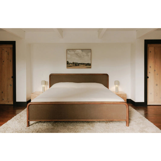 Rye Bed by Moe's Home Collection in warm brown. Made from solid mango wood frame, tatami mat over mdf headboard, footboard, wood slats in a traditional style.