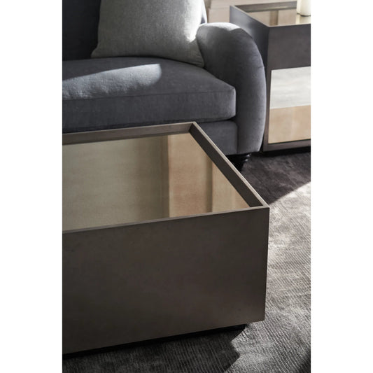 Dark Matter Cocktail Table by Caracole in mirrored, black and twilight frost, almost black. Made from poplar, mirror in a transitional style.