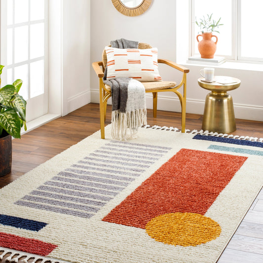Casablanca Shag Rug by Livabliss in ivory, rust, medium gray, navy, burnt orange, burgandy. Made from main: 100% polyester in a modern style.