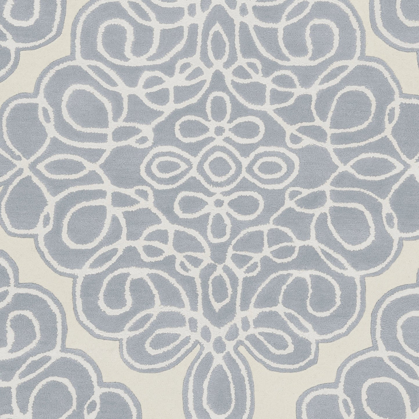 005 18186-9714 | Closeup | Modern Classics Rug - 266 by Surya in denim, light beige, cream. Made from 100% new zealand wool in a unique style.