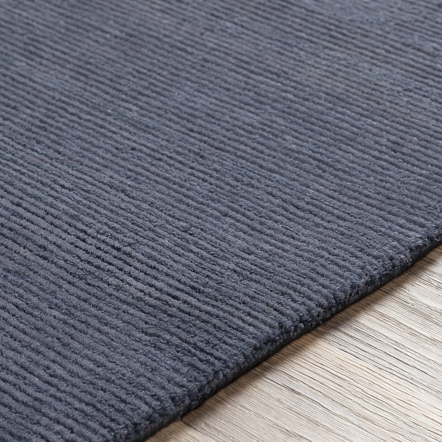 008 102217-43424,102217-43426,102217-43427 | Closeup | Capri CAP-2300 Rug by Surya in dark blue. Made from 60% viscose, 40% wool in a unique style.