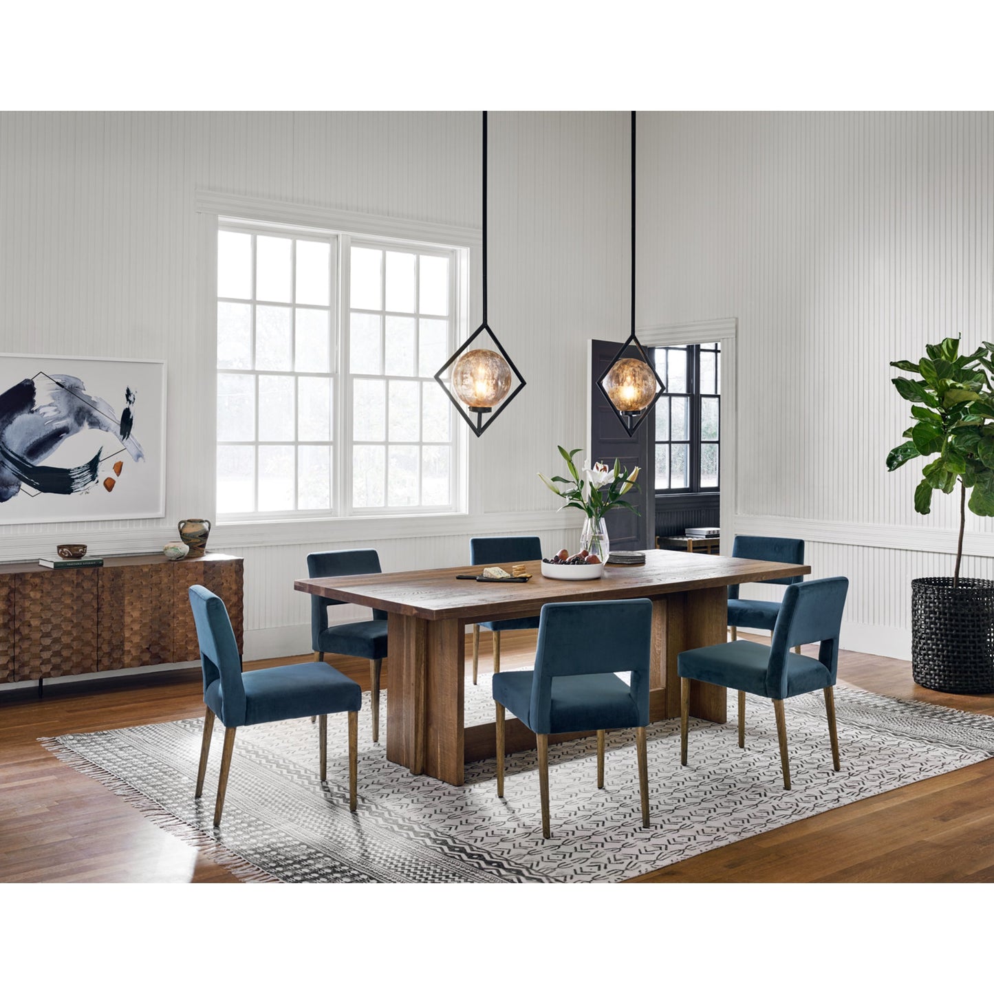 027 SR-369081 | Lifestyle | Joseph Dining Chair by Four Hands in toasted nettlewood. Made from unique in a transitional style.